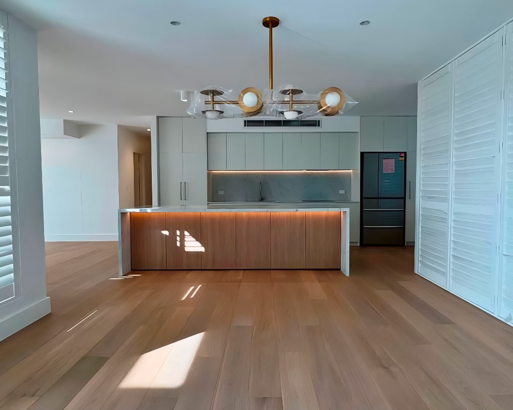 kitchen with wooden flooring and overhead lights