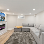 living room with gray sofas and tv